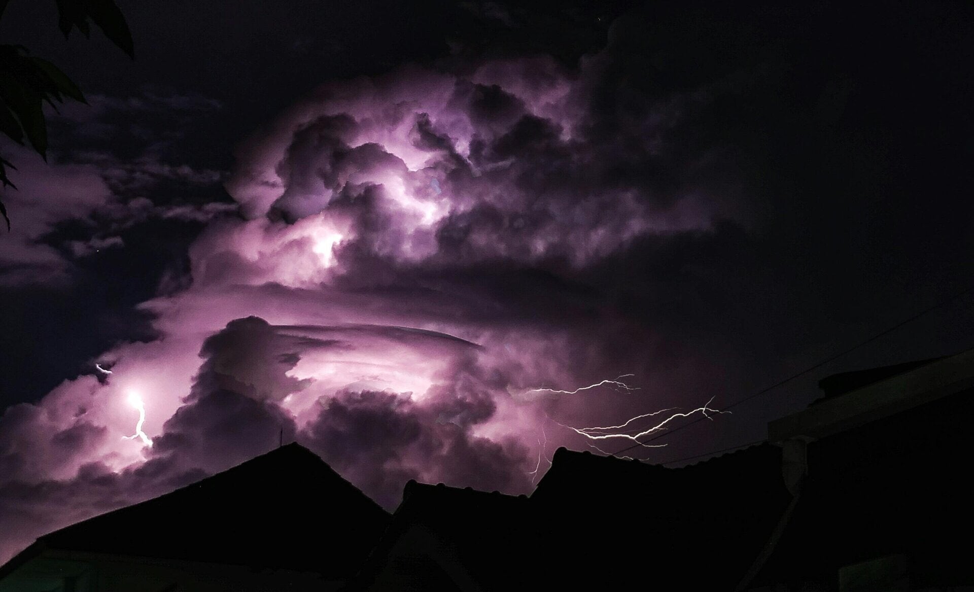 Picture shows a dark storm representing the internal storm from childhood trauma before specialised talking therapy with Caroline Smith