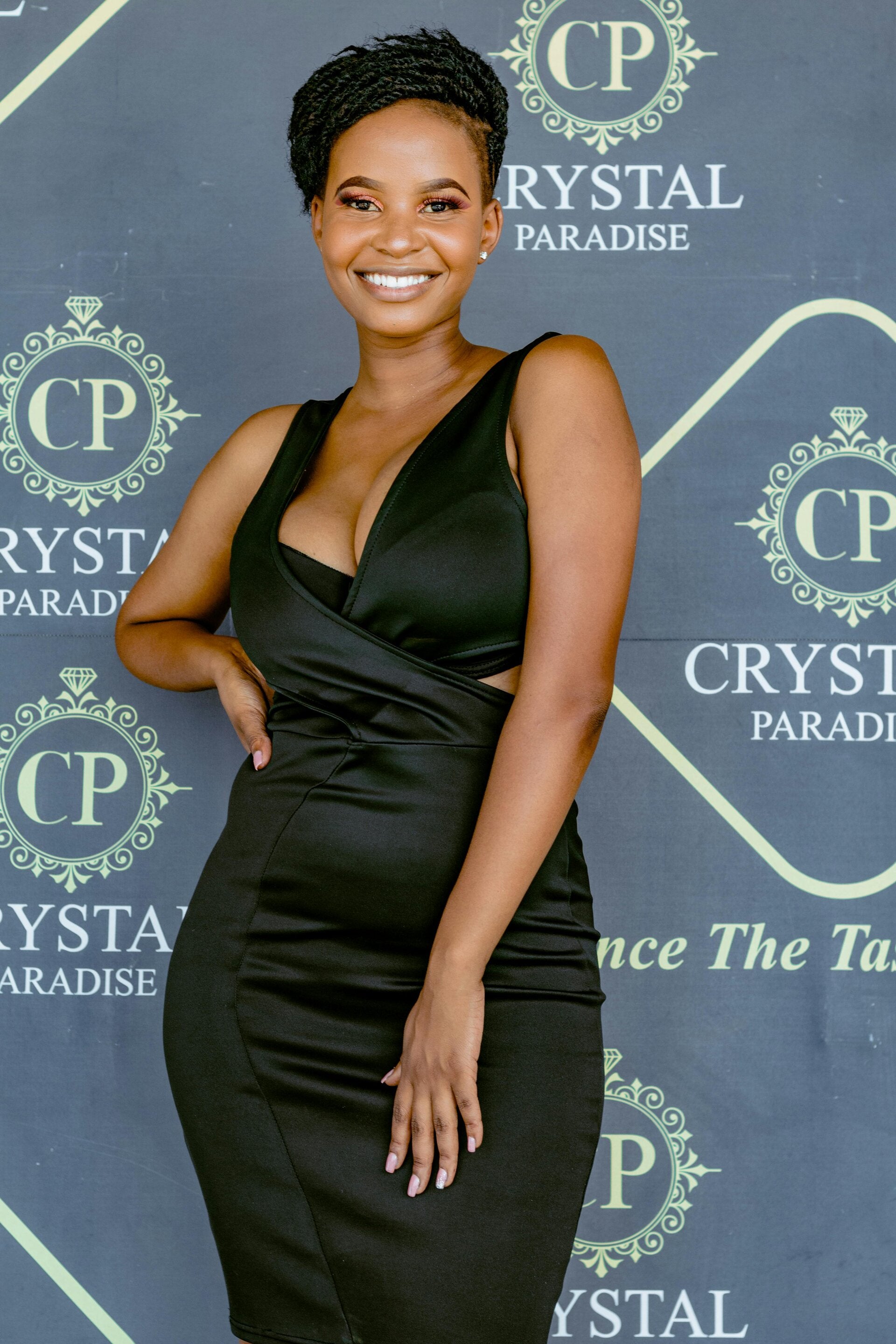 Elegant corporate gala photo booth experience with branded event backdrop