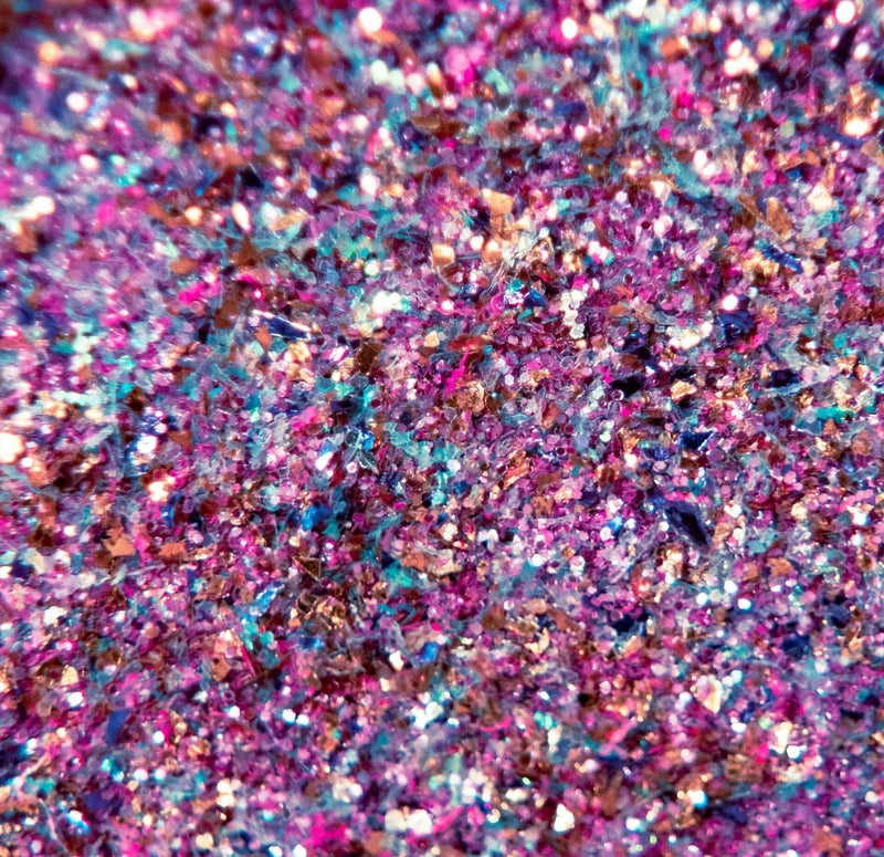 fulli image of mixed glittler with a lot of pink and purple, representting neurosparkly enthusiams and motivation