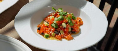 Salmon Tartare is a delightful blend of richness and flavor, topped with the perfect finishing touch to satisfy your taste buds.