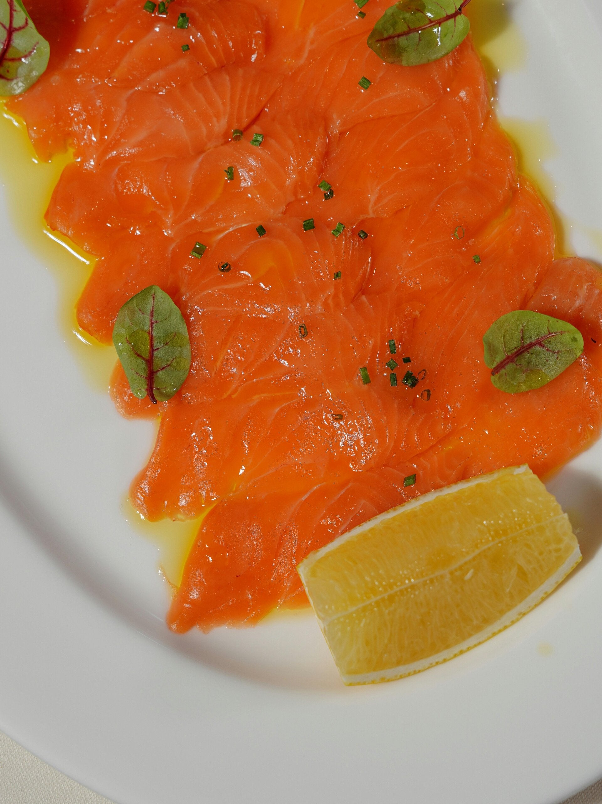 Fresh Salmon Tiradito with just enough zest and a tangy sauce for your total satisfaction.