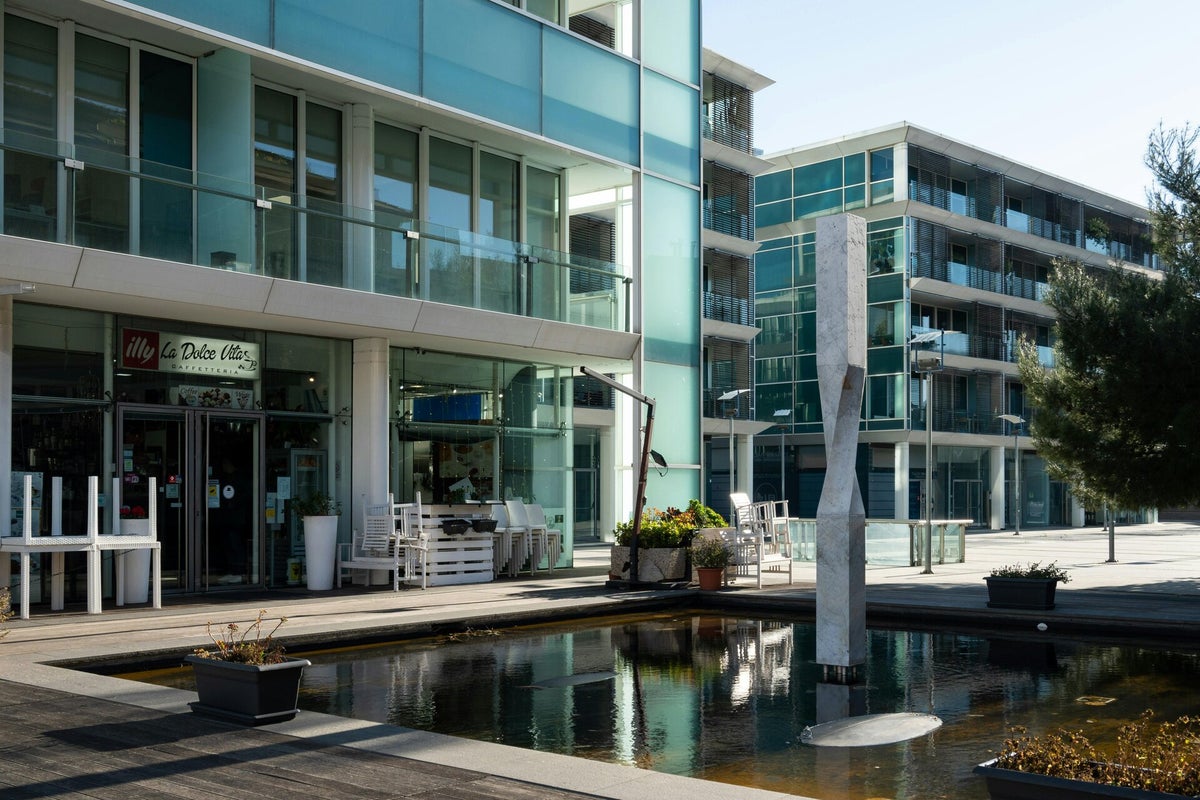 Modern residential and commercial buildings beside the water