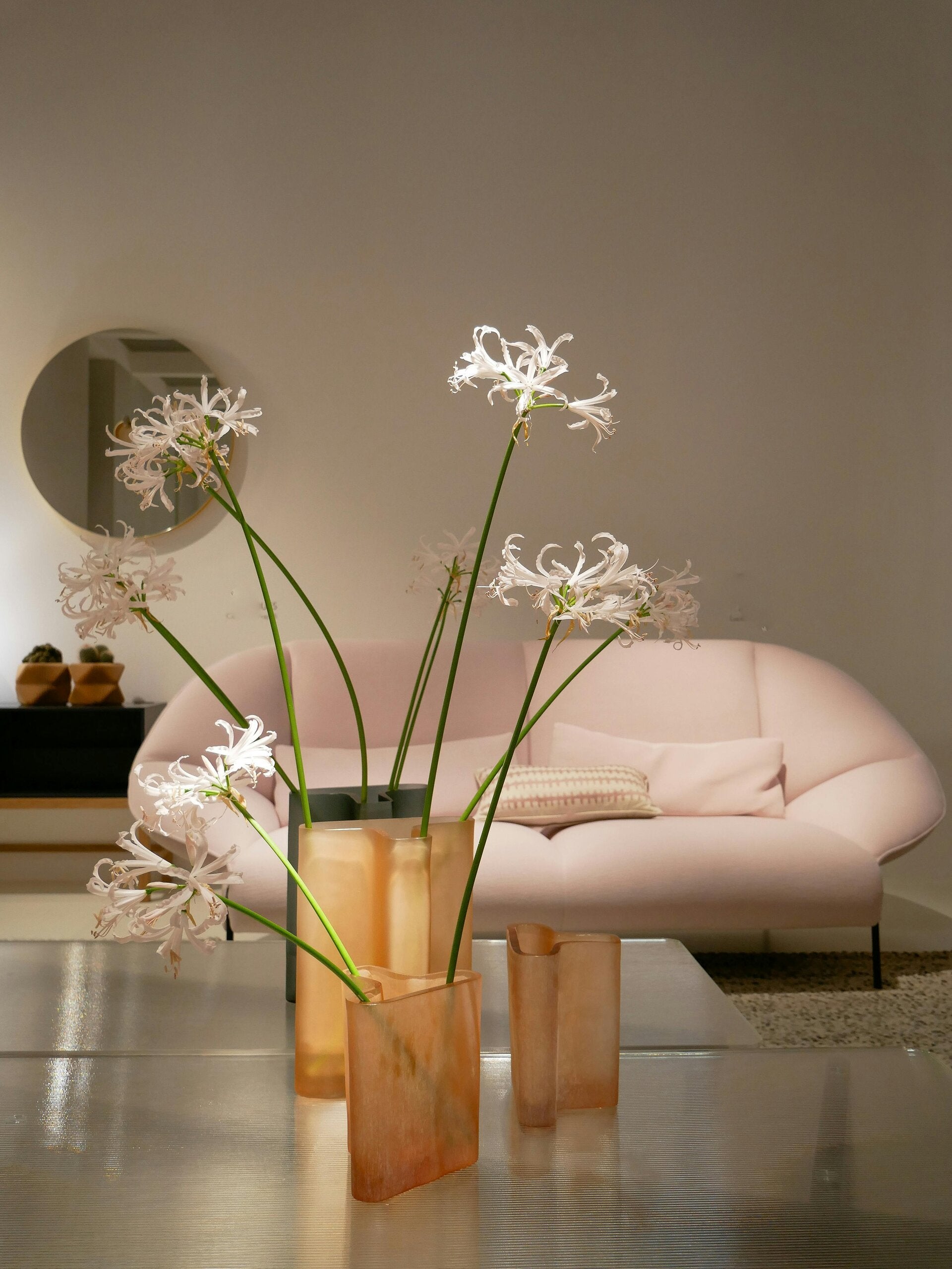 Elegant sculptural vase with bold design used as a centerpiece in modern home styling