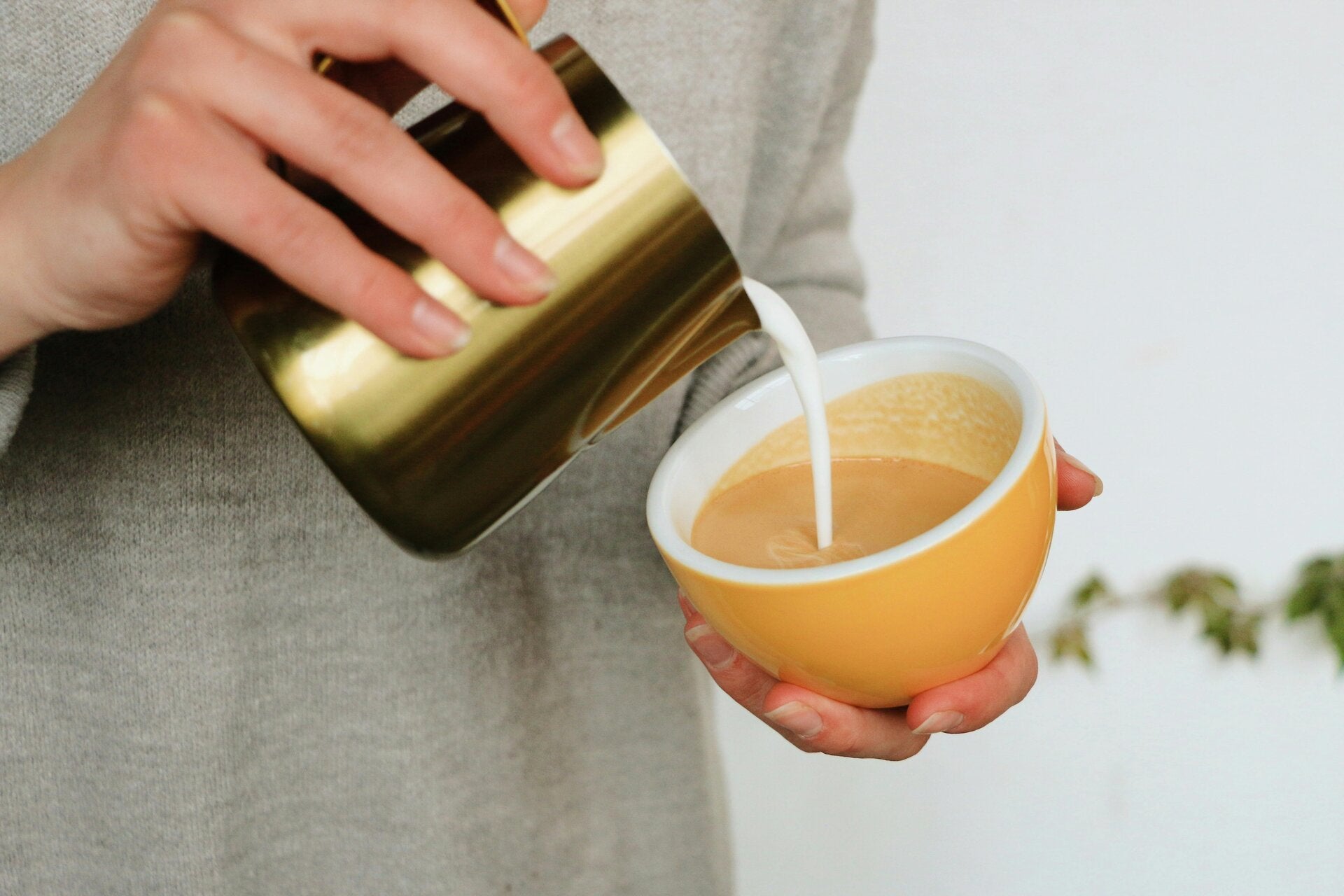 A warm, golden-hued Cannabis Golden Milk in a mug, a health-conscious choice for cannabis edibles and Stoner Strategies fans.
