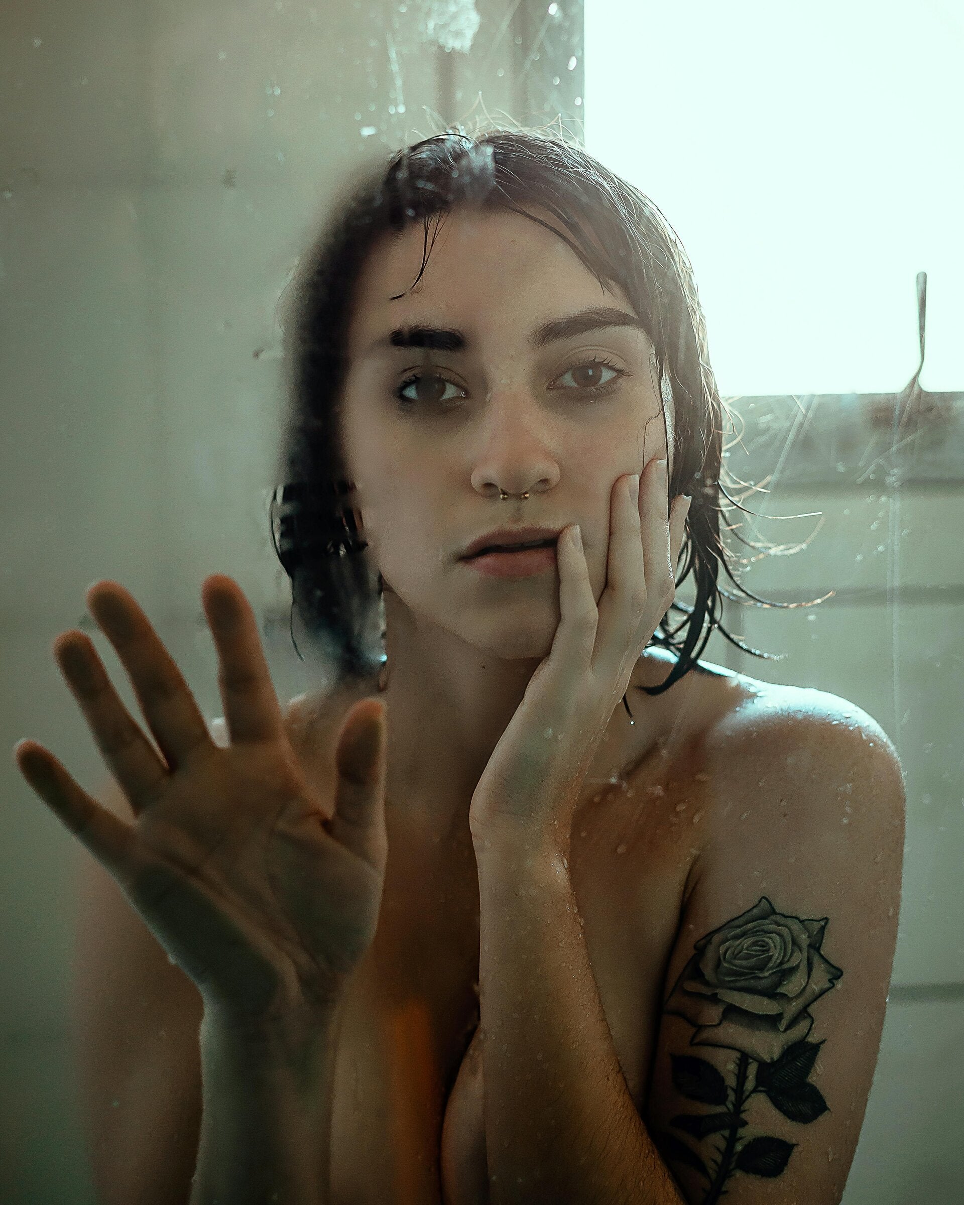 sad perimenopausal woman in shower