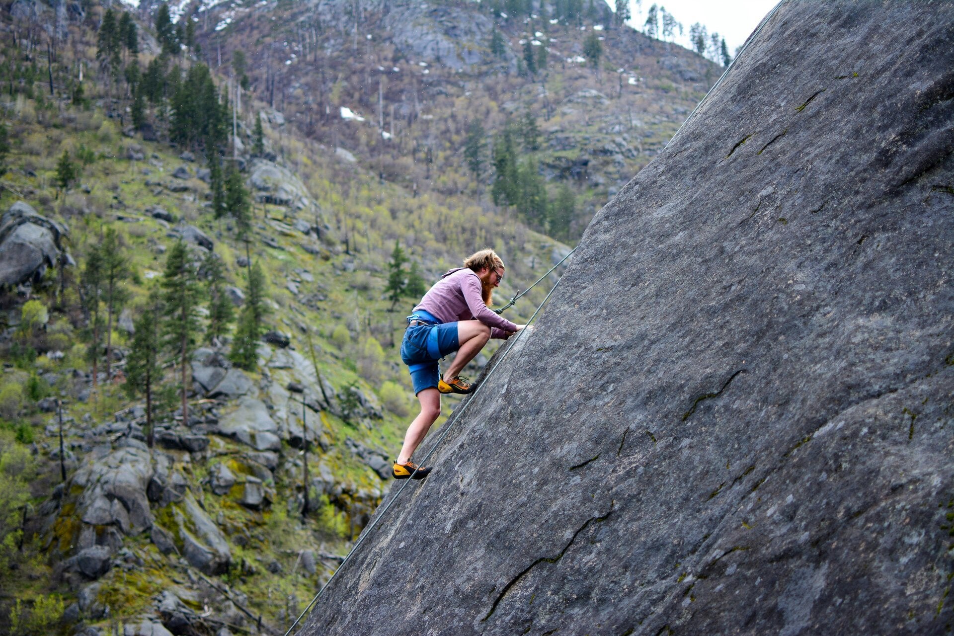 Man climbing a rock