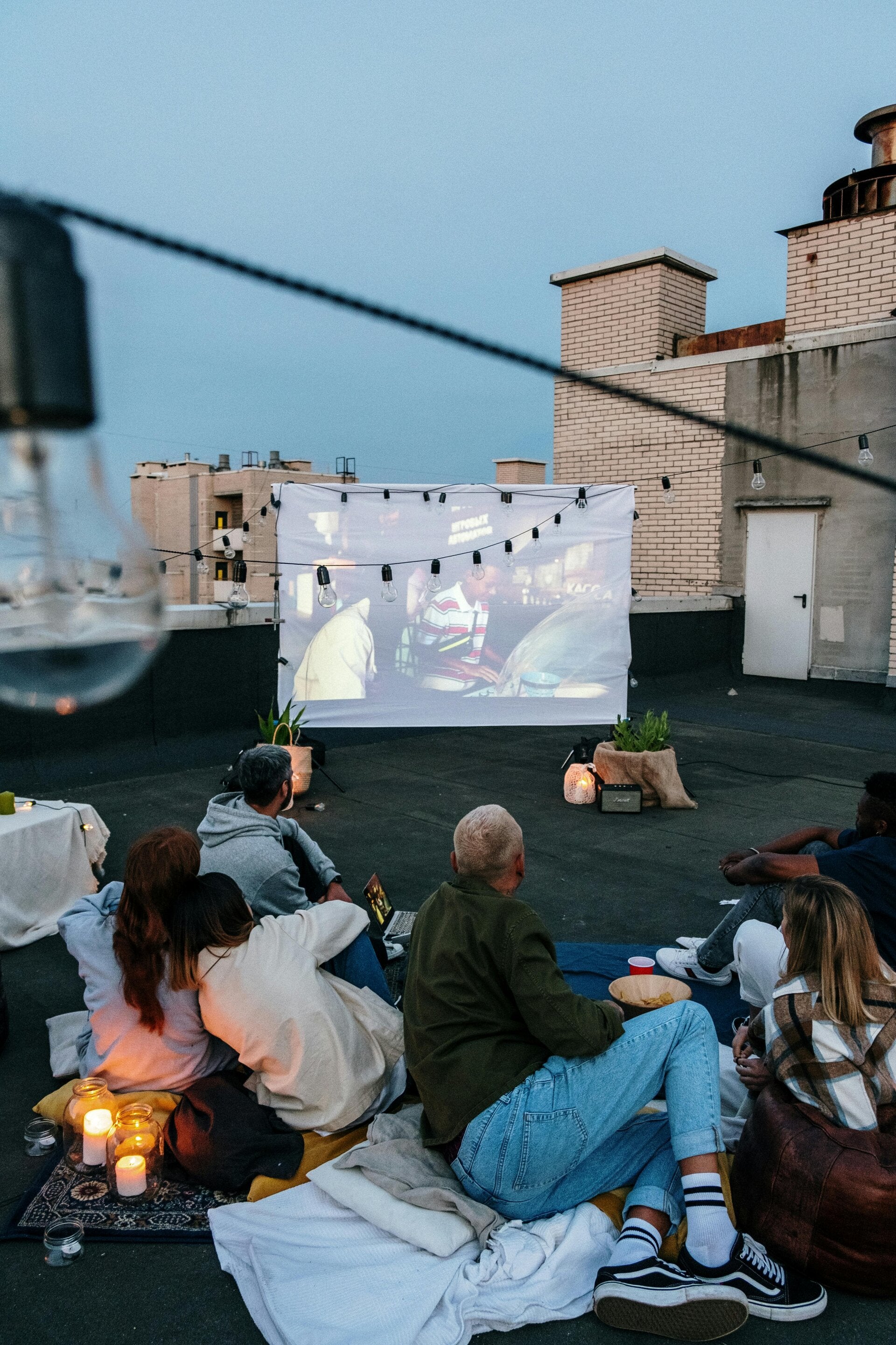 Royalty free image of rooftop movie screening