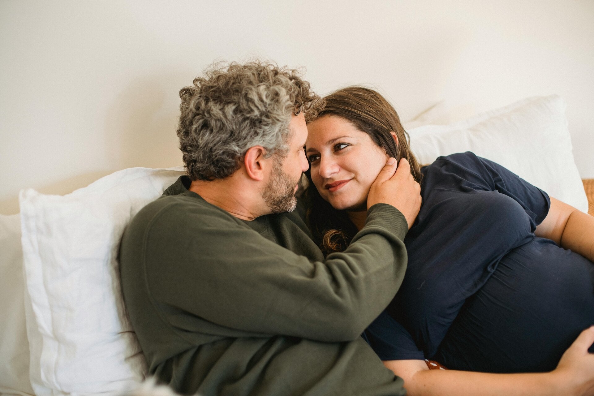 couple embracing in bed