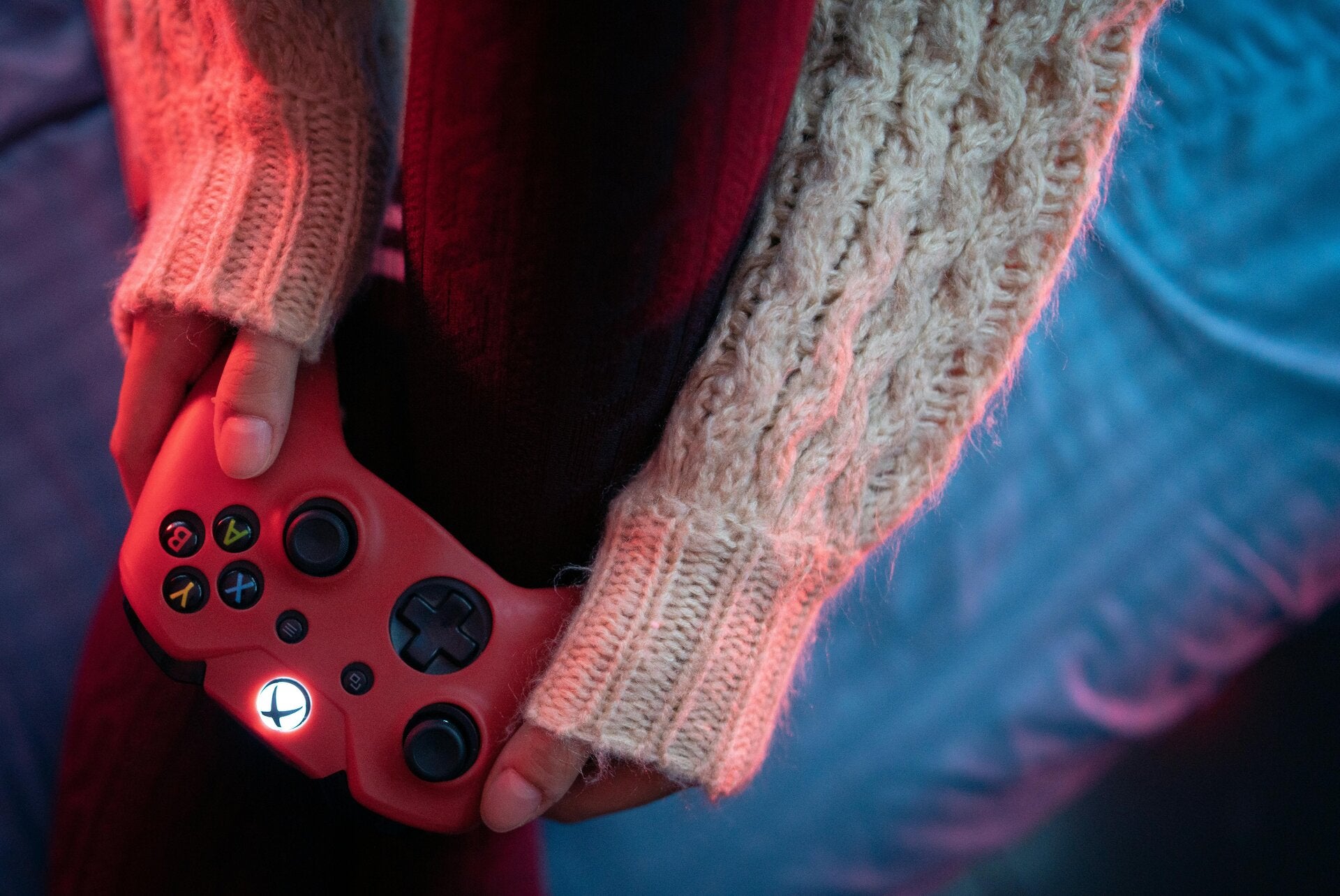 hands holding a videogame controller