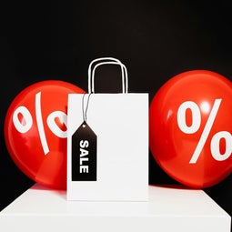 A sign stating Sale