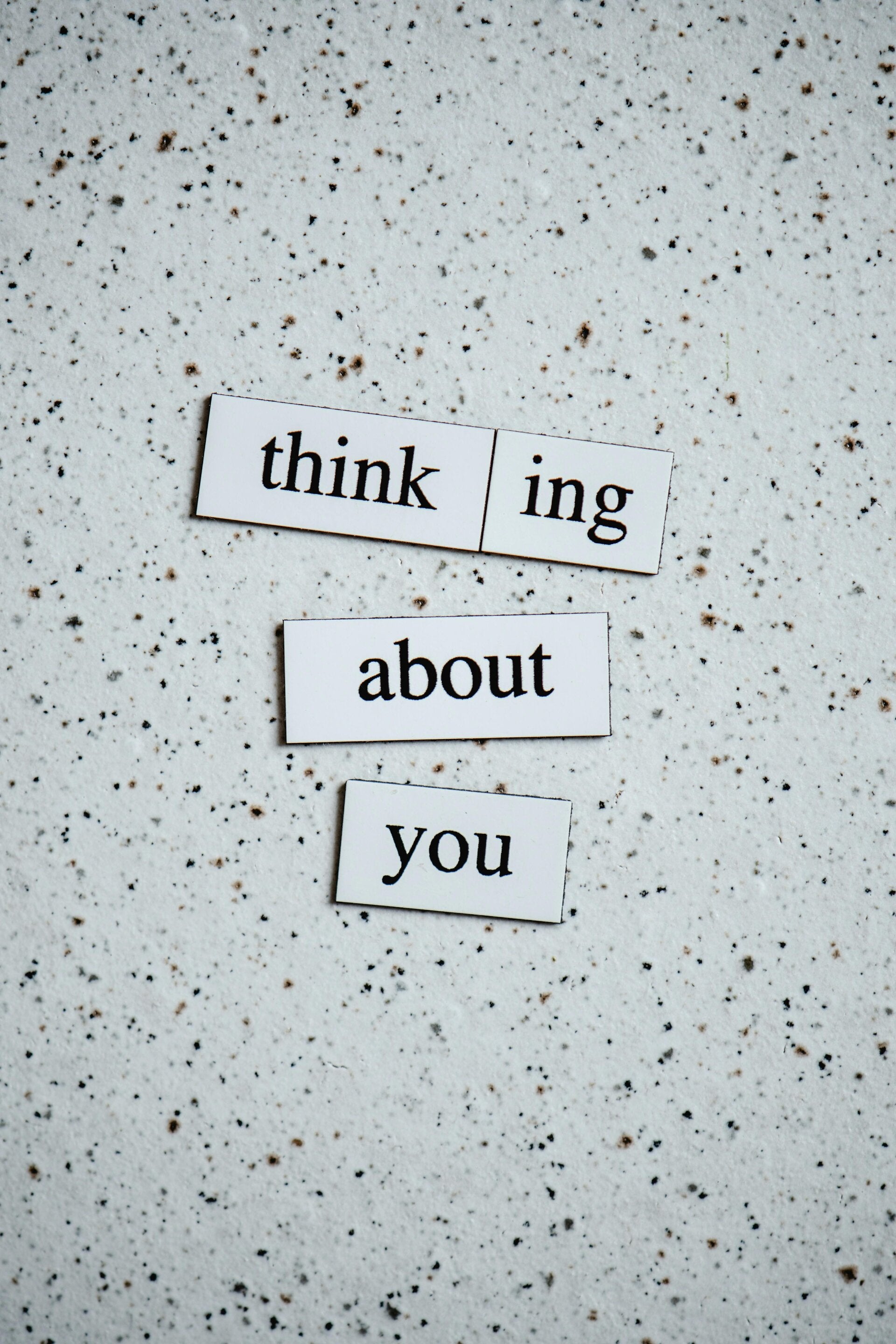 Thinking about you spelt out in black letters on white background