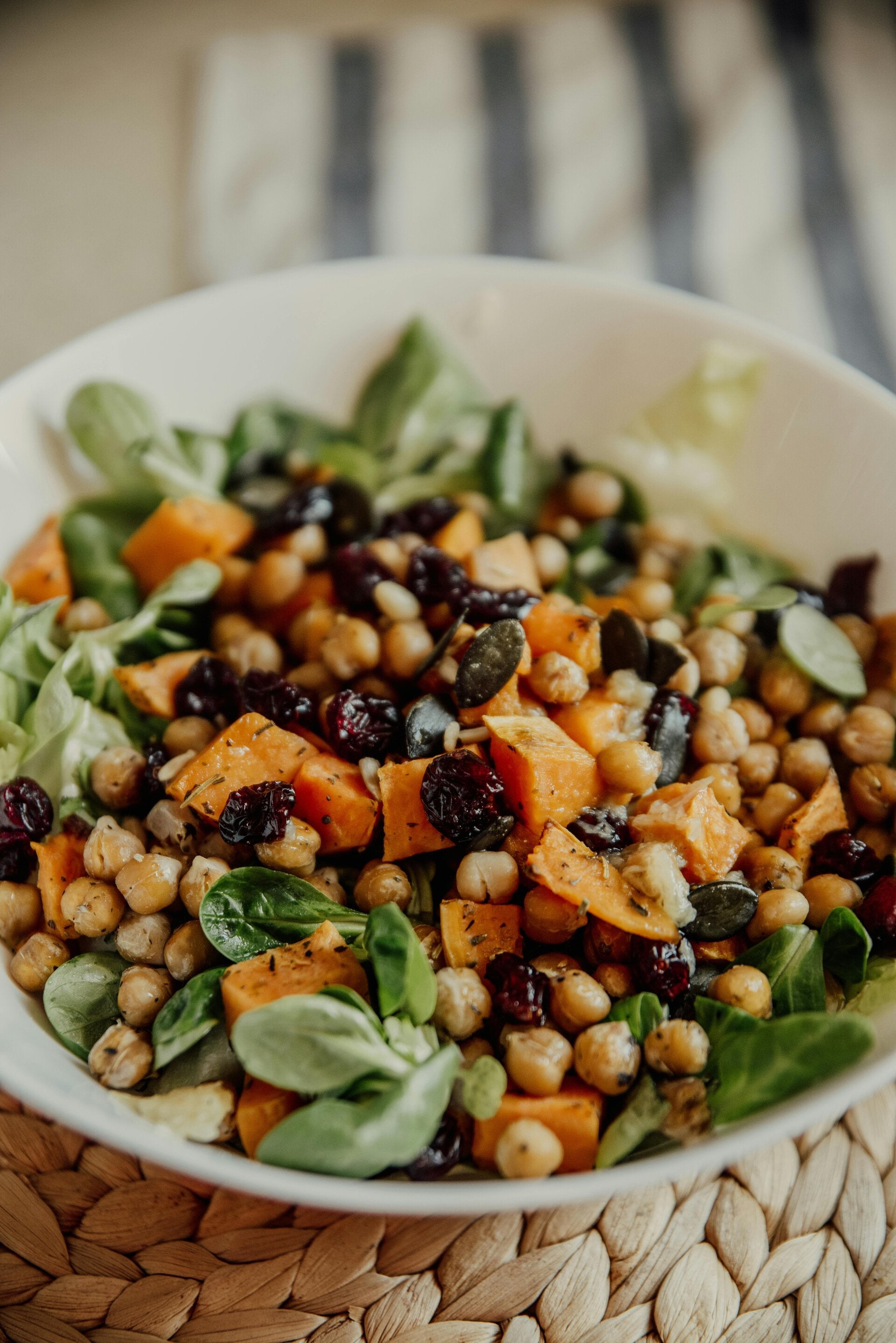 Delicious Mediterranean Salad with chickpeas and raisins and a zesty dressing.