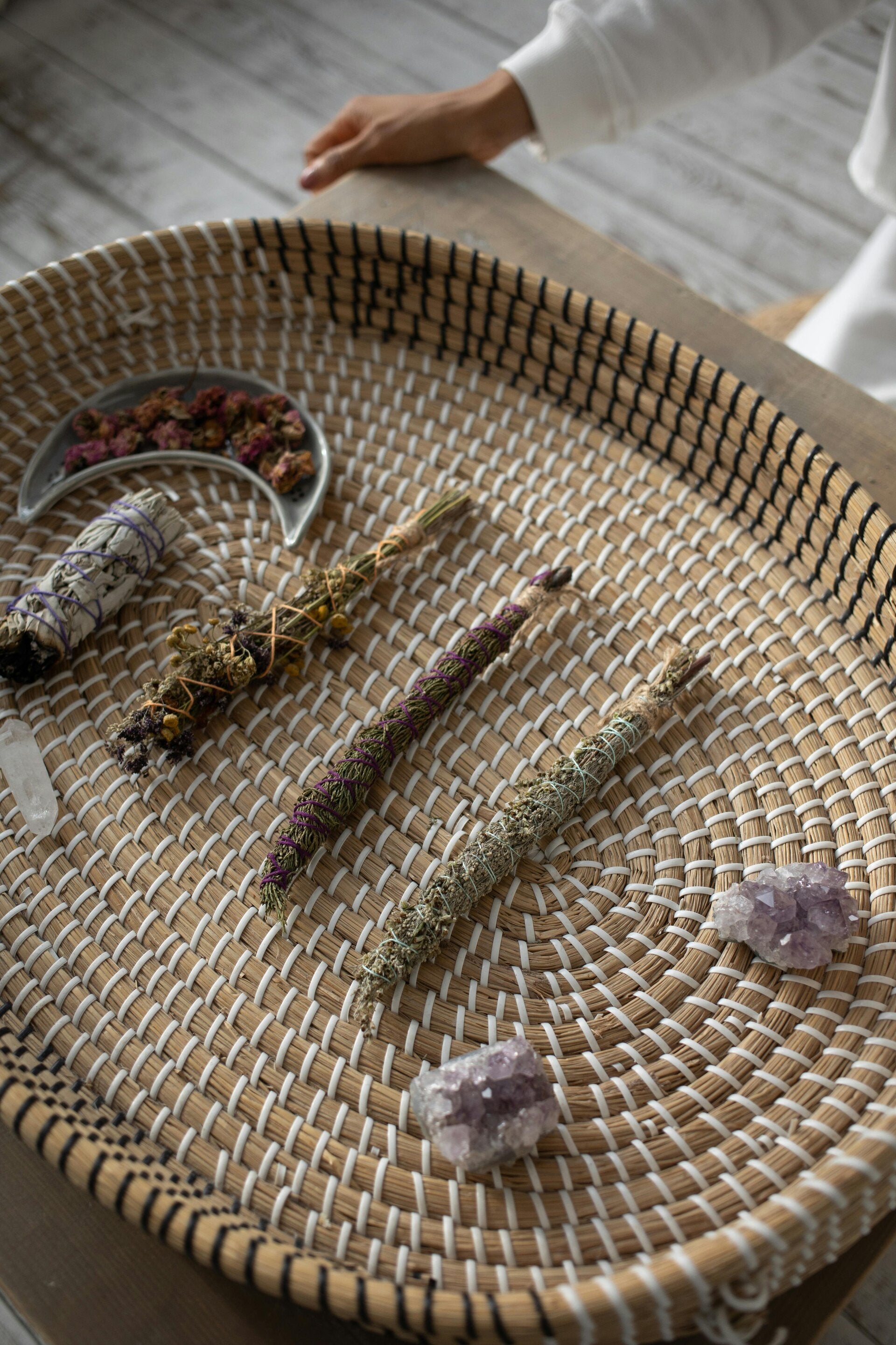 Ceremonial basket with herbs and crystals
