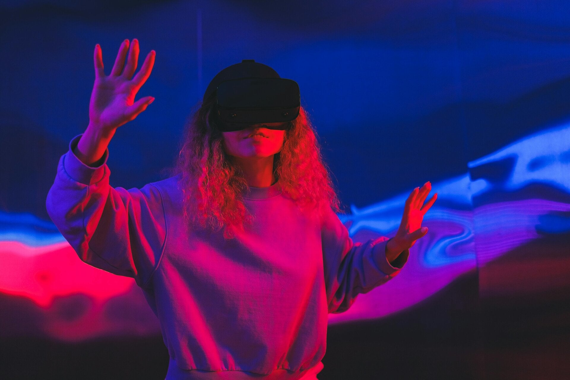 Individual using virtual reality indicating a new experience
