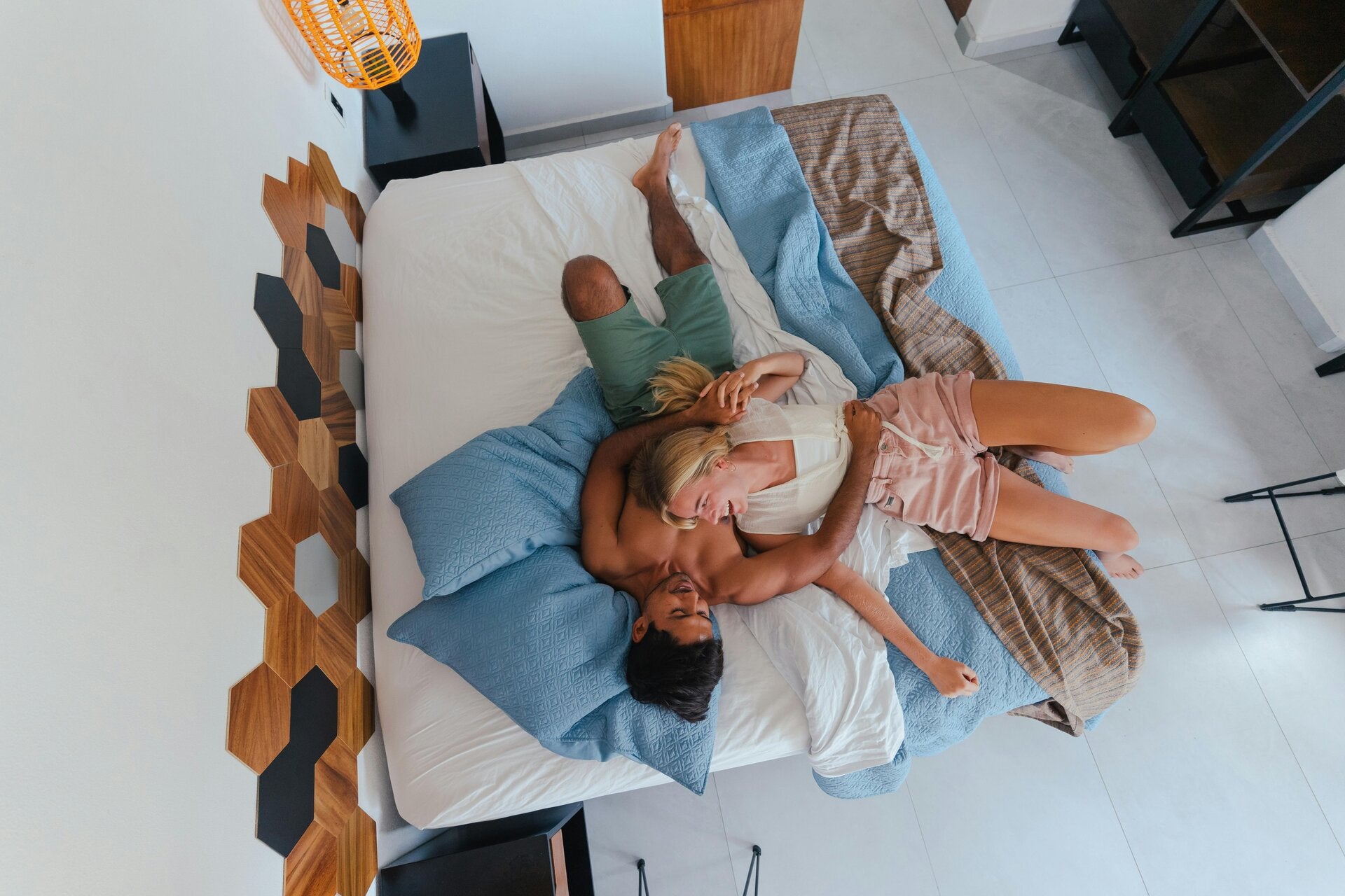 coouple laying in bed