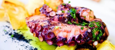 Savor the irresistible taste of grilled octopus, paired with a variety of flavorful toppings—perfect for every occasion.