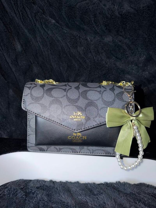 SIGNATURE ENVELOPE CROSSBODY BAG