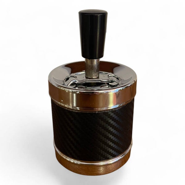 Ashtray with push/twist mechanism