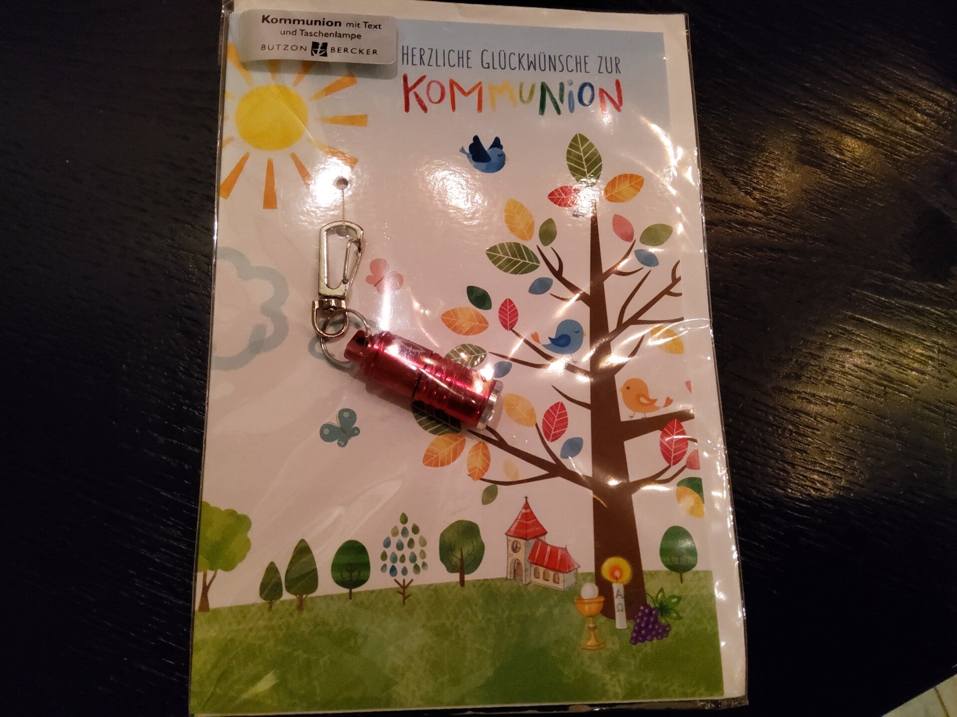 Kommunion mit Taschenlampe