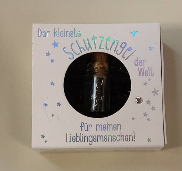 ein kleines Schutzengerl im Korkenglas