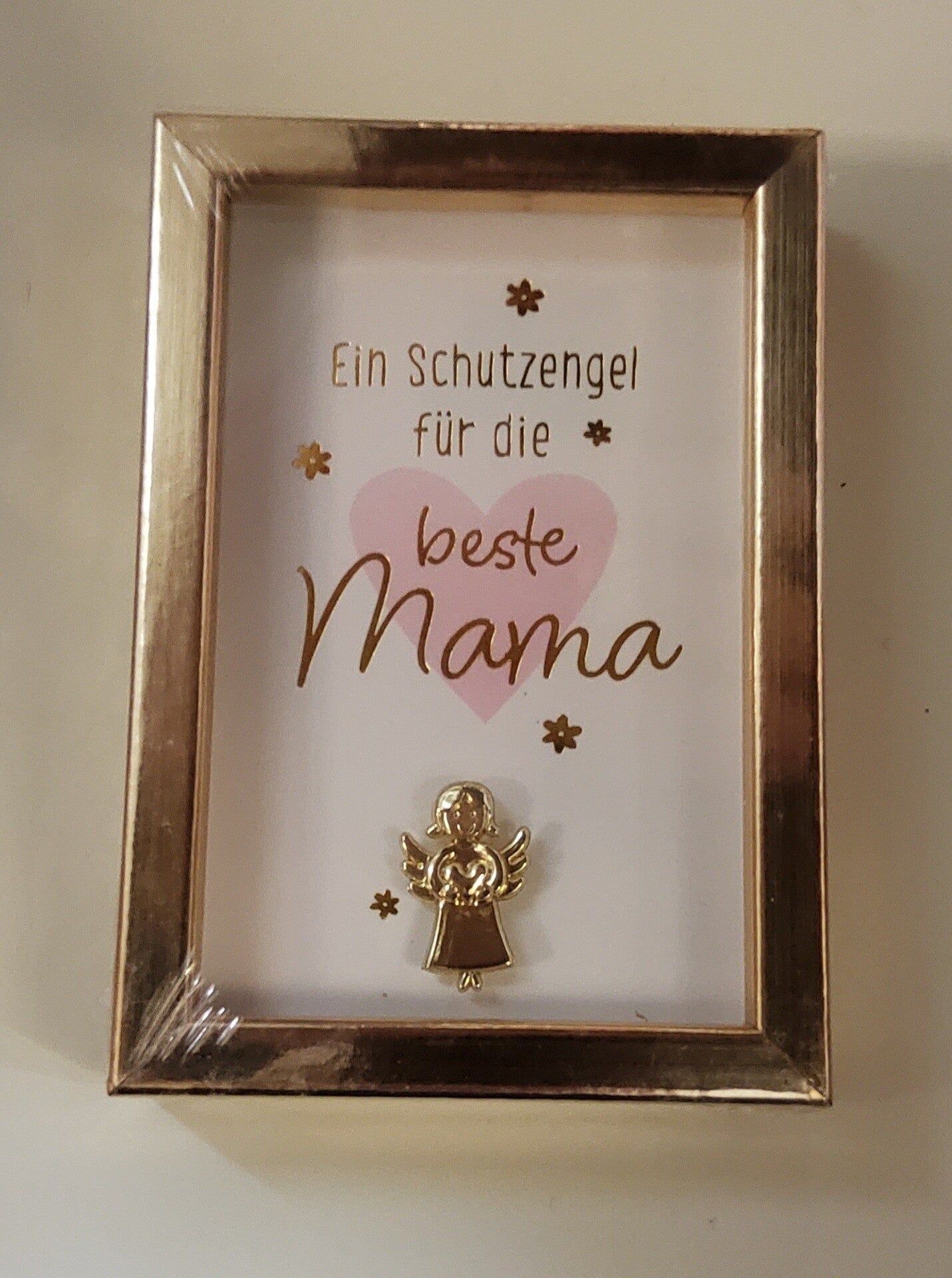Schutzengerl im Bilderrahmen