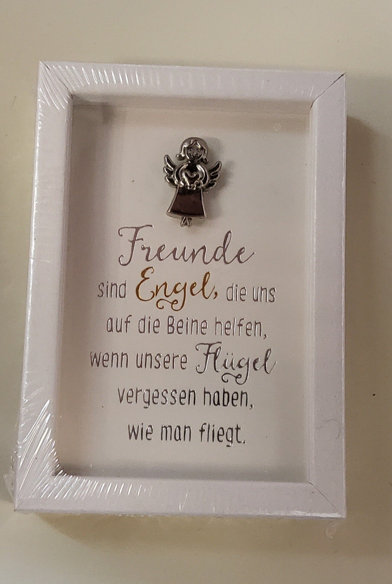 Schutzengerl im Bilderrahmen