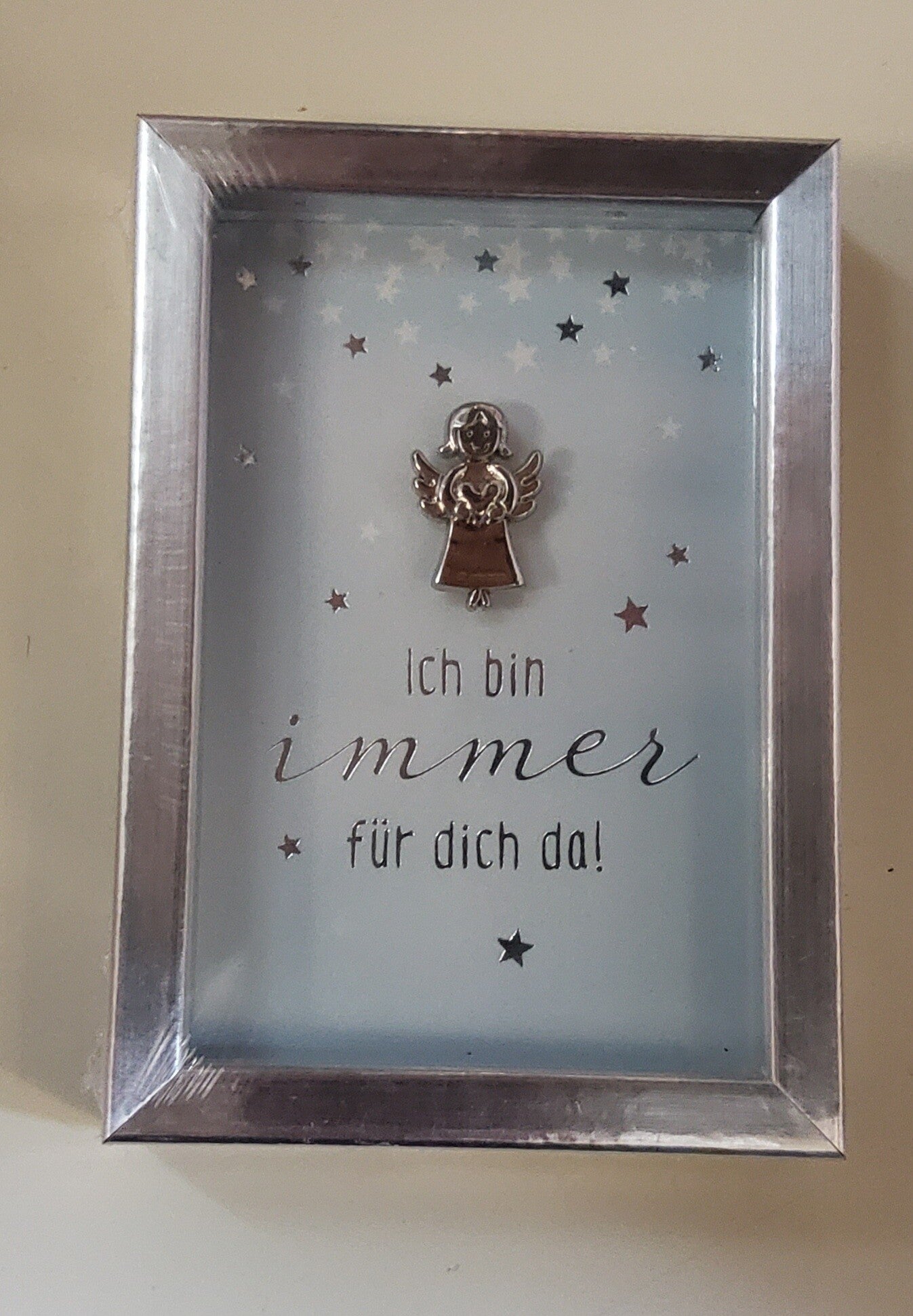 Schutzengerl im Bilderrahmen