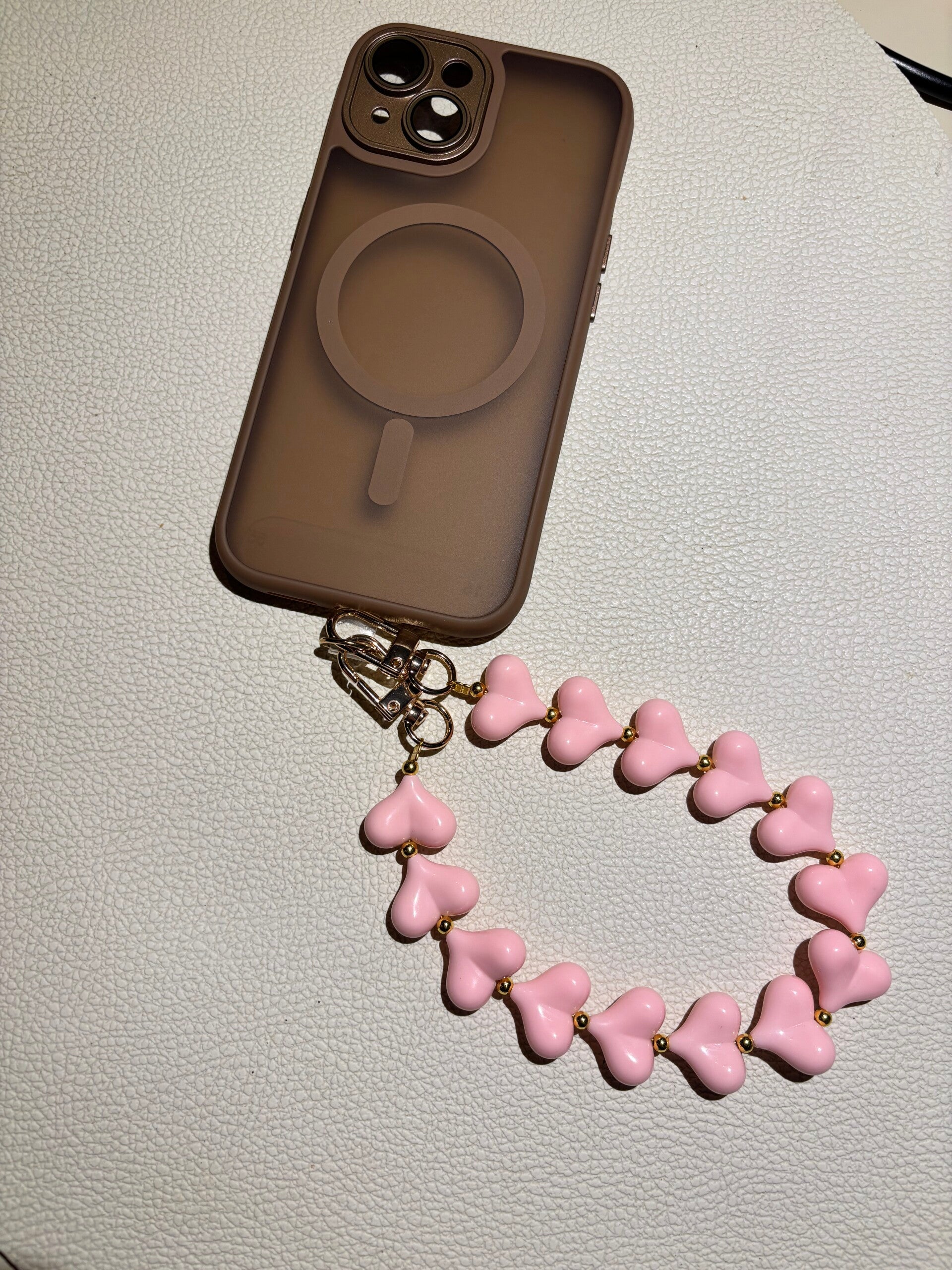 Telefoonhanger roze hartjes