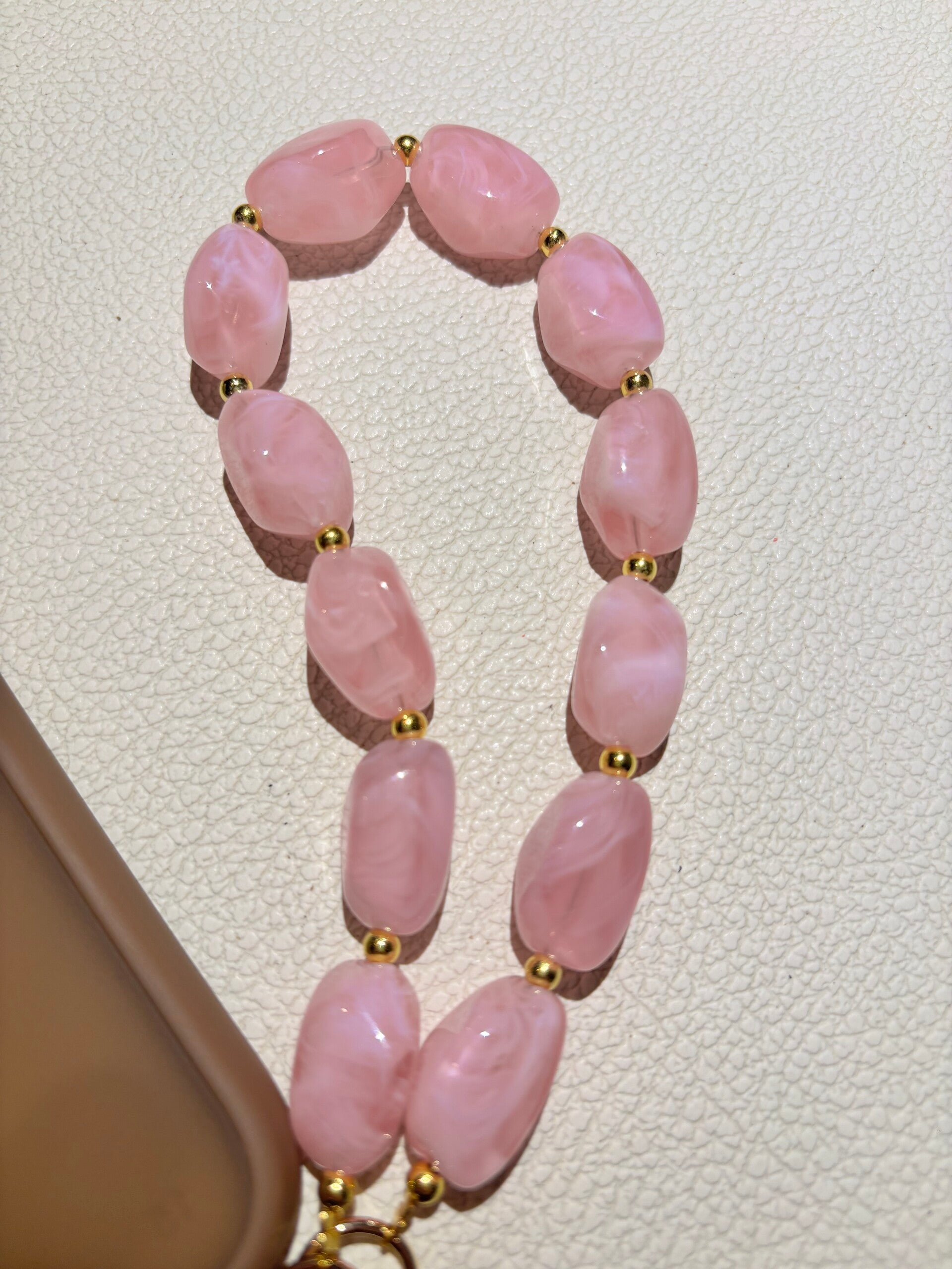 Telefoonhanger roze