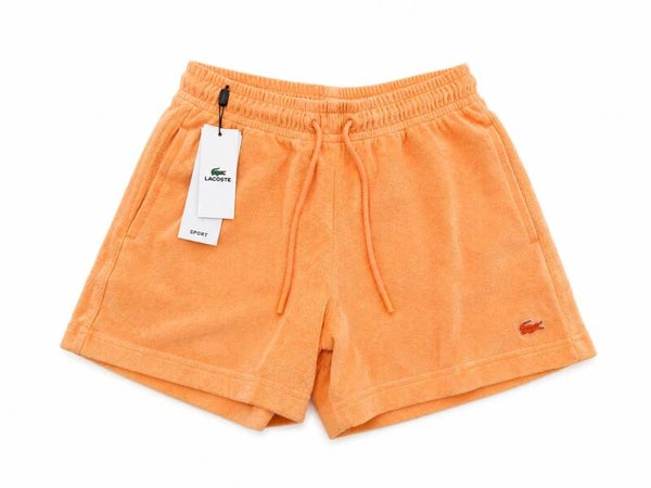 Short Lacoste orange – Confort & style estival