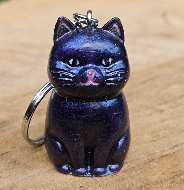 "Zittend Katje" Sleutelhanger Paars