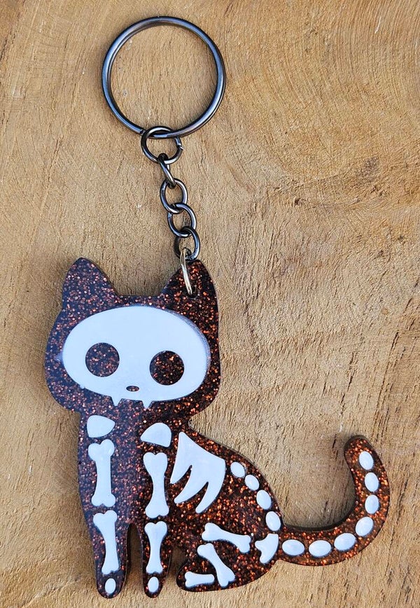 "Skeleton Kitty" Zittend Bruin Glitter