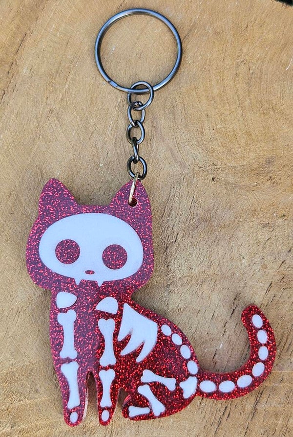"Skeleton Kitty" Zittend Rood Glitter