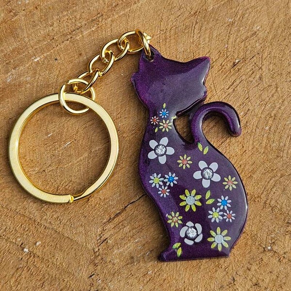 "Kleurrijke kattenkwaad" Sleutelhanger Zittend Bloemen