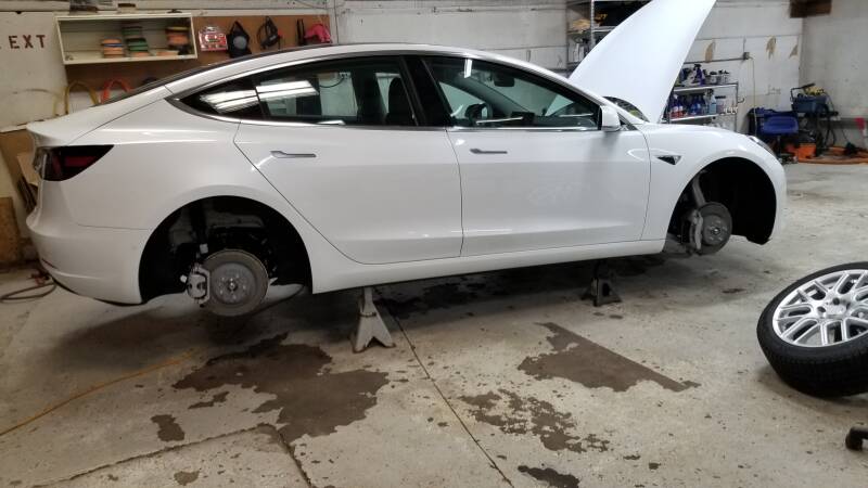 New Tesla with wheels off detailing and ceramic protection