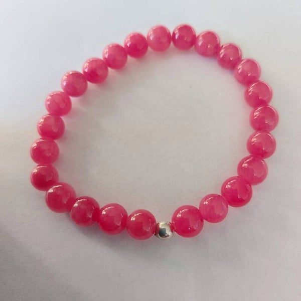 Rhodoniet armband met een zilveren kraal