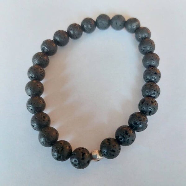 Lavasteen armband  en een zilveren kraal