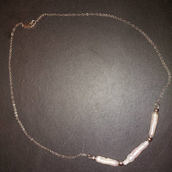 Lange parels centrepiece met zilveren ketting