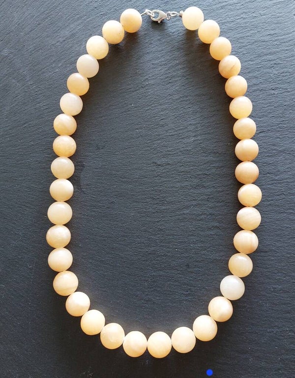 Gele calciet ketting 12 mm kralen met lobstersluiting