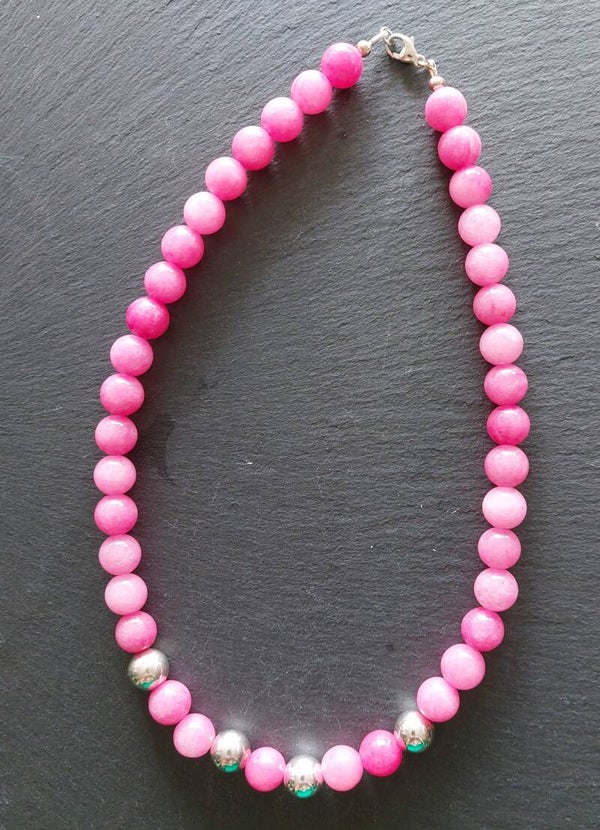 Rhodoniet ketting (10mm) met grote zilveren tussenkralen met lobstersluiting