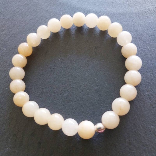 Gele Calciet armband met kleine zilveren kraal