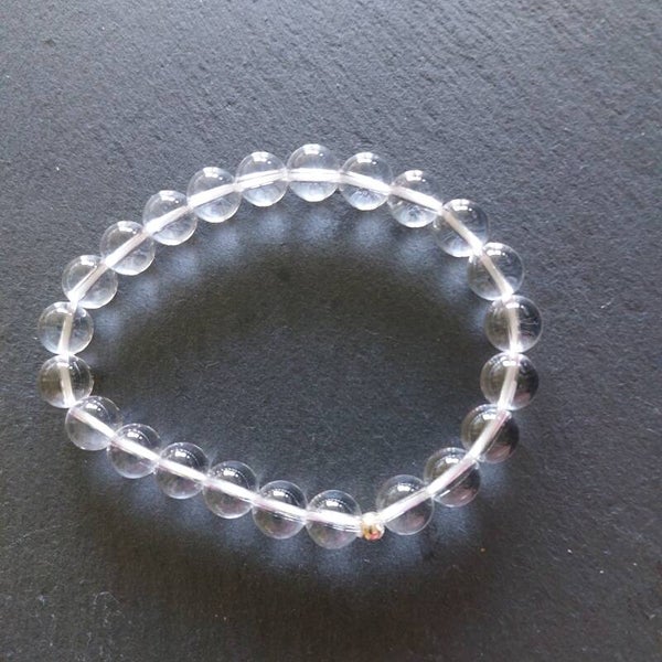Bergkristal armband met een zilveren kraal