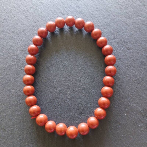Donker oranje carneool armband van 6 mm kralen