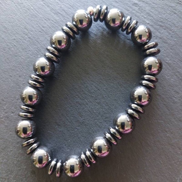 Hematiet armband van ronde en donut kralen met zilveren kraal