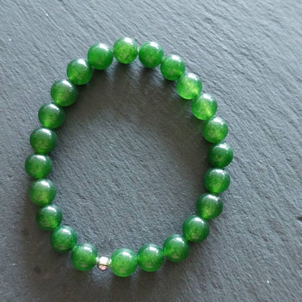 Groene agaat armband met 8 mm kralen en een zilveren kraal