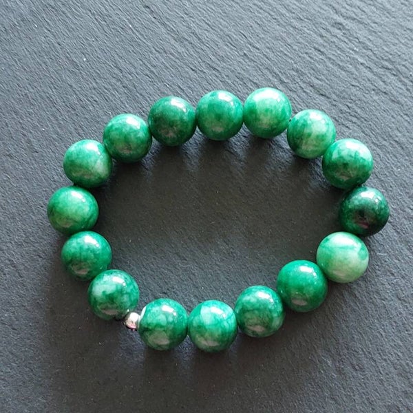 Groene jade armband 12 mm met zilveren kraal
