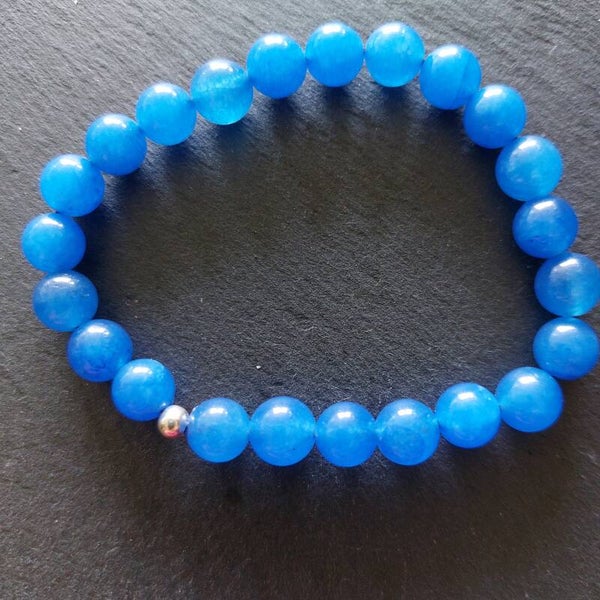 Blauwe agaat armband met een zilveren kraal