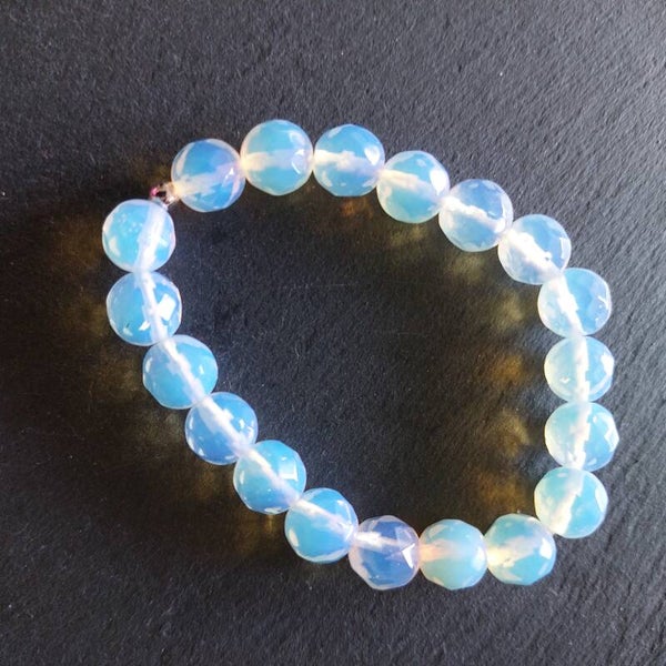 Opaliet armband 10 mm kralen met een zilveren kraal