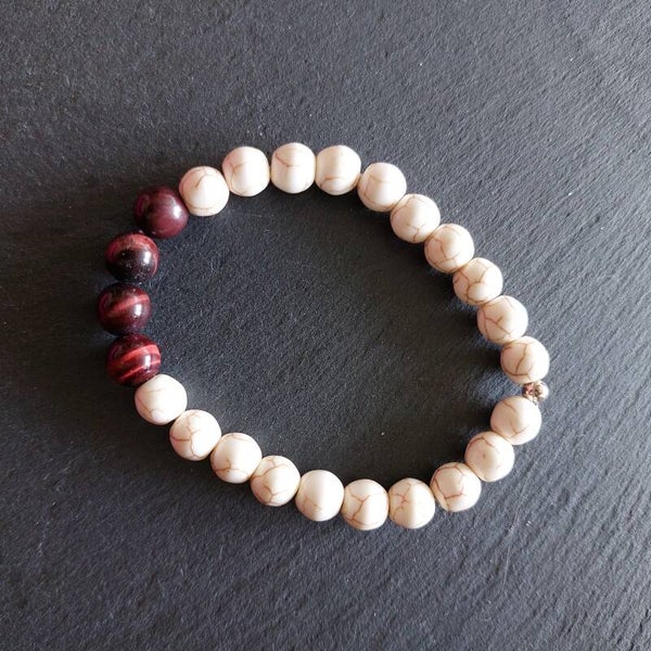 Howliet armband 8mm met tijgeroog centrepiece en een zilveren kraal