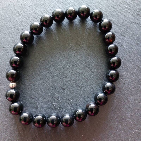 Onyx armband  en een zilveren kraal